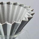 Origami wave paper filter for flat bottom pour over coffee brewing with Origami dripper