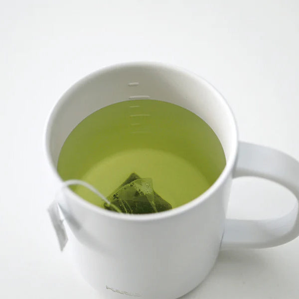 Hario Thermal Mug - white with tea