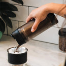 dosing coffee from the Fellow Shimmy Coffee Sieve