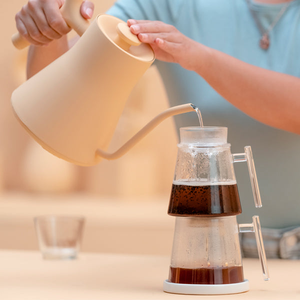 Pouring water in to top of the PureOver Filter Coffee Maker